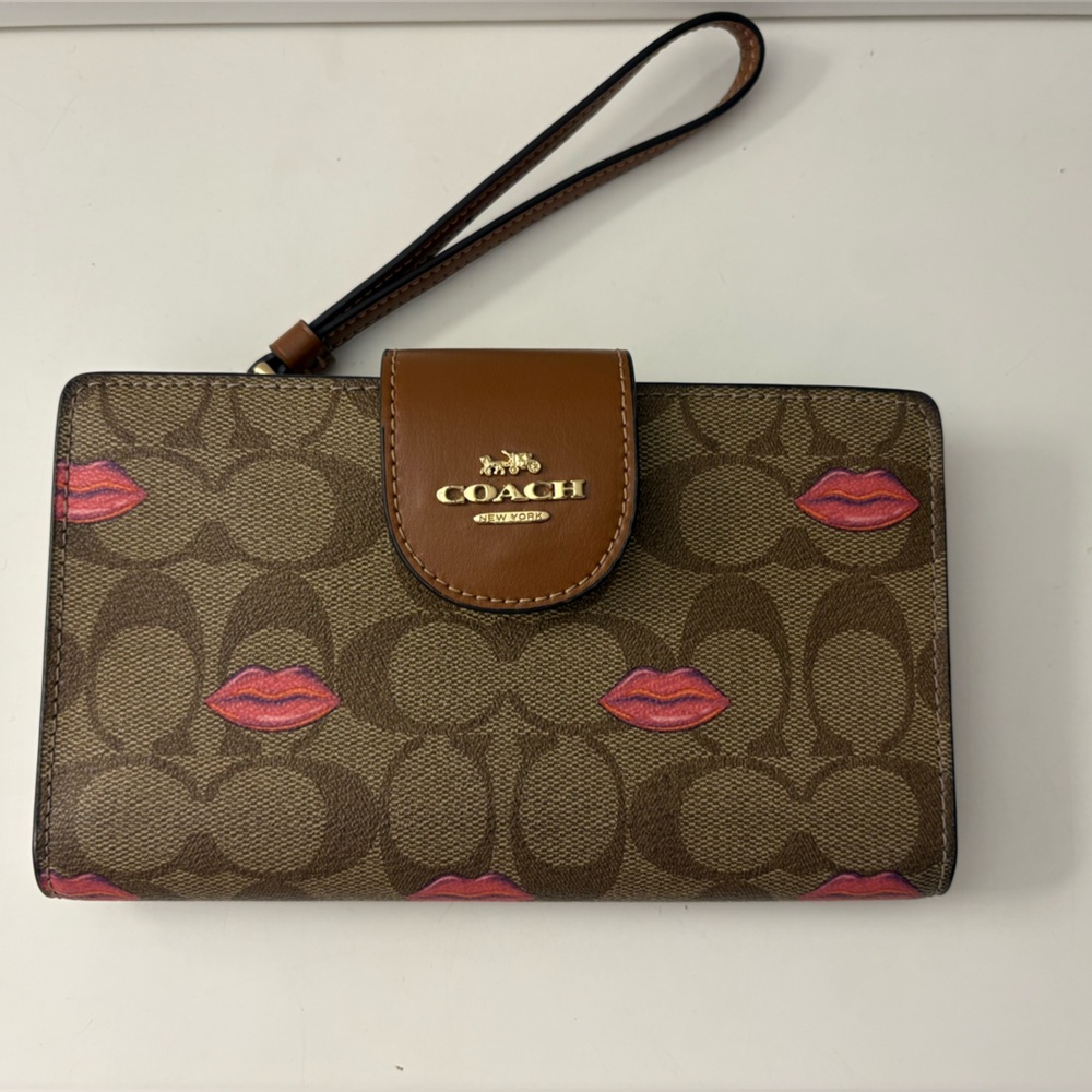 COACH Brown Signature Tech Wristlet with Pink Lip Accents